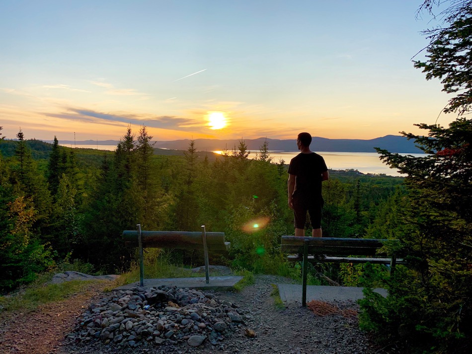 Arthur taking in the lookout view as the sunsets on the Dalhousie Mountain trail. 