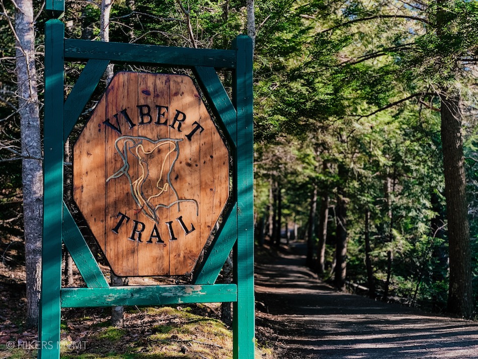 Sign indicating Vibert Trail trailhead in Victoria Park. 