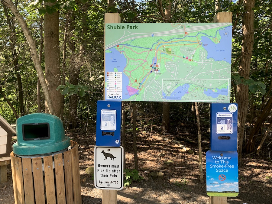 A park sign and map at the entrance of Shubie Park.