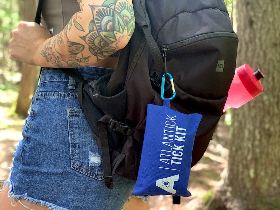 A close up of our Atlantick Tick Kit on Julias book bag that we take with us hiking. 