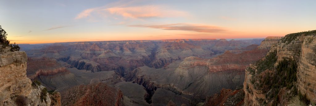 Panorama shot of the sunset over the Grand Canyon on the Rim Trail.