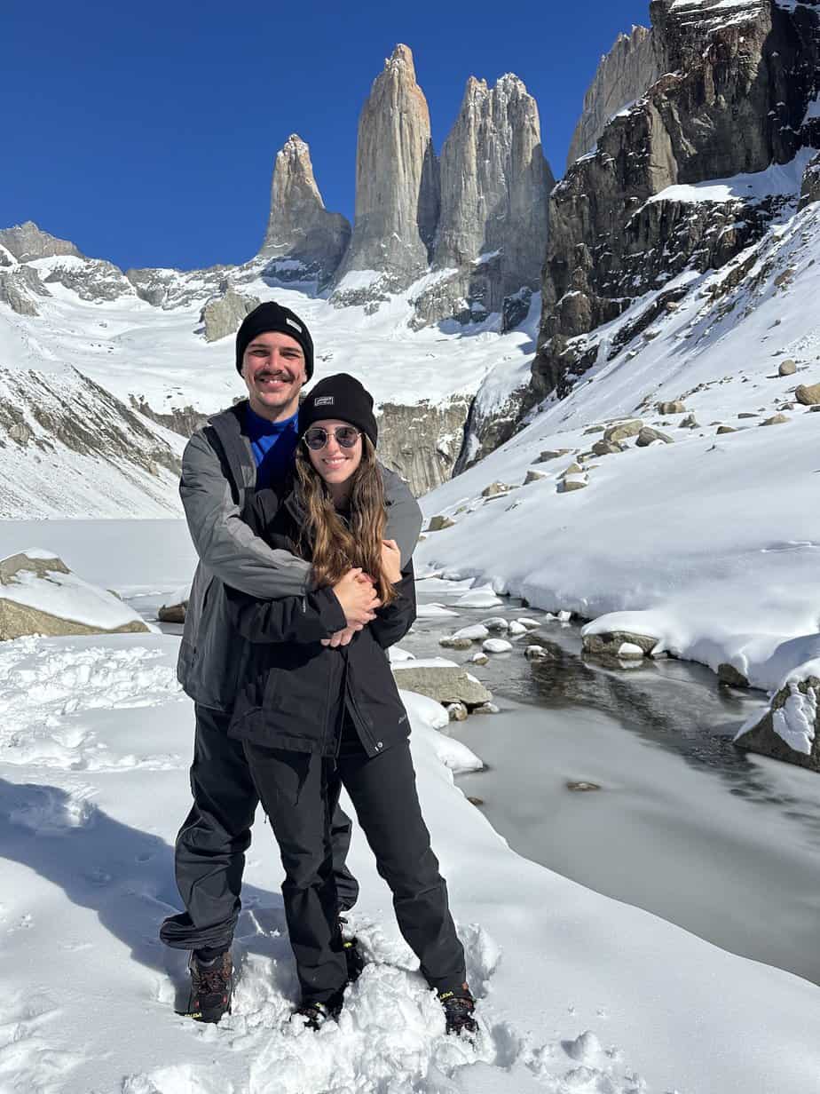 Arthur and Julia, owners of Hikers Movement standing in front of Base Towers in Torres de Paine. 