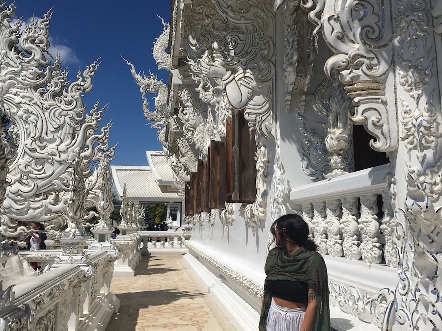 Travel on a budget: Julia at a chapel in Thailand