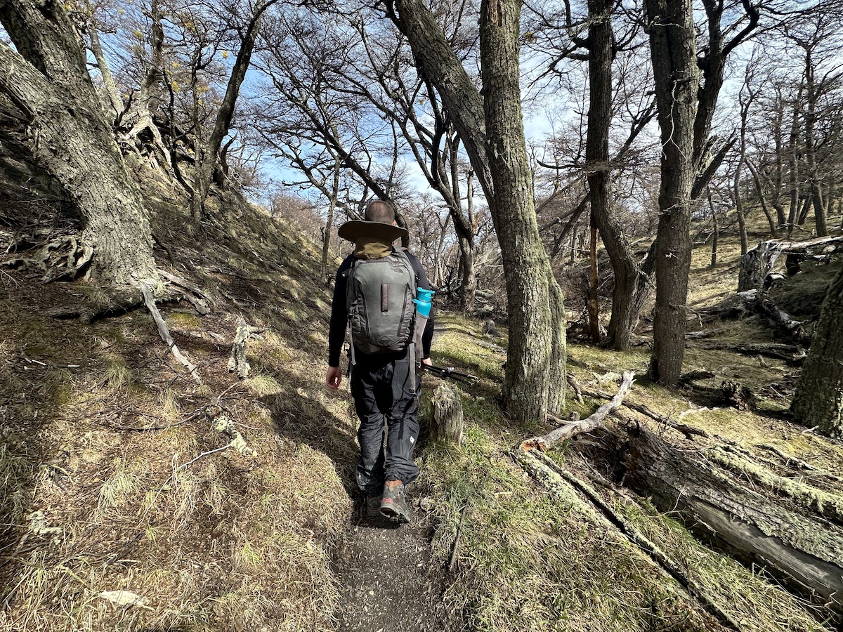 Hiker practicing Leave No Trace by staying on the designated trail